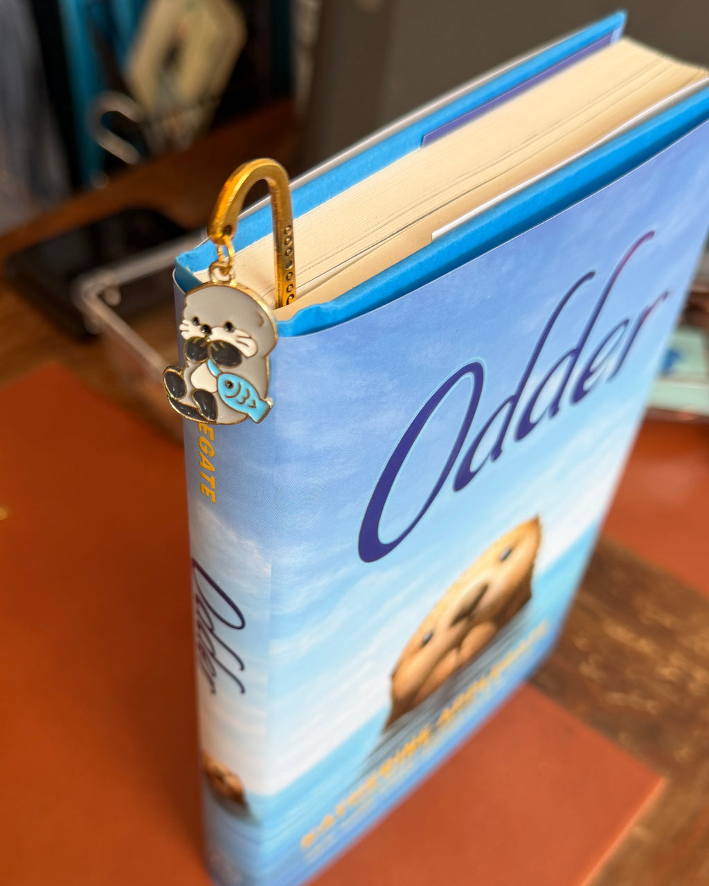 Metal bookmark with enameled Otter